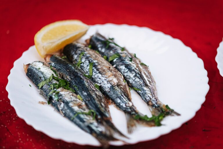 Grilled sardines plate lemon