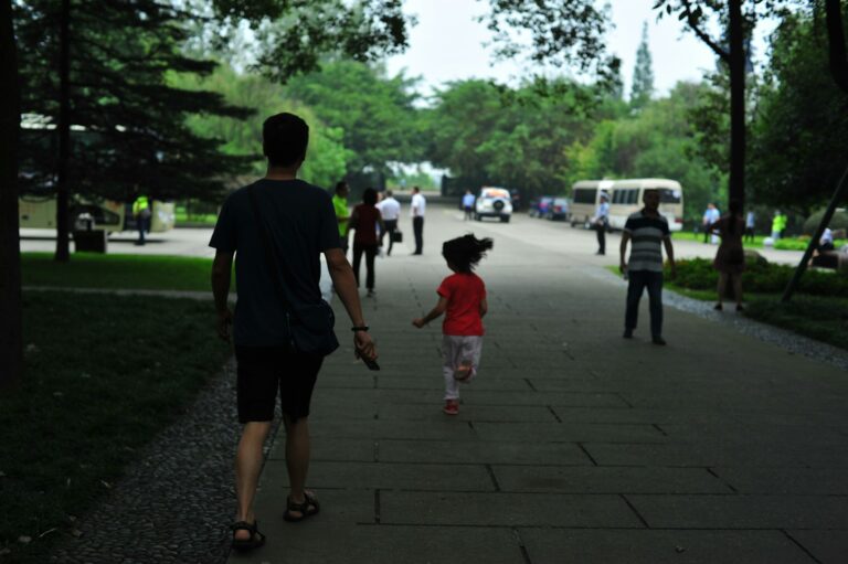 Parents exchanging child car park