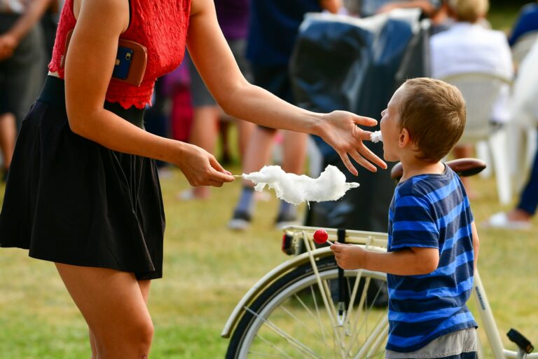 Child scraped knee bandage parent teaching child bicycle