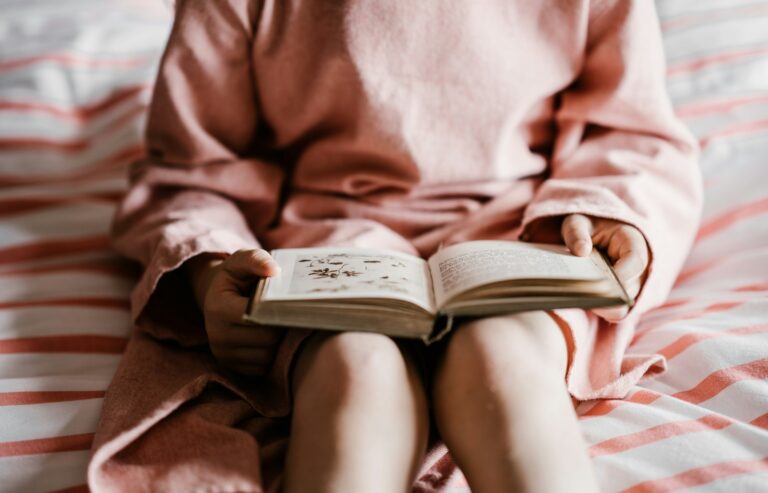 Child practicing deep breathing exercise cozy kids reading