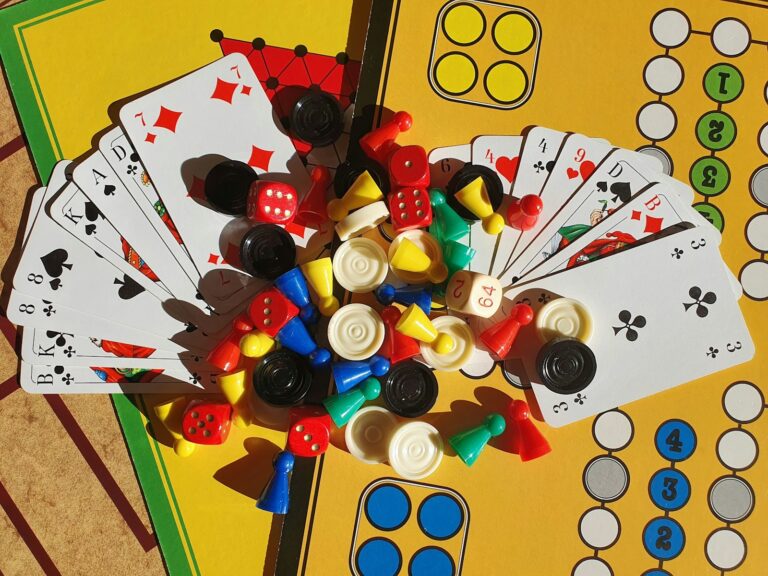 Close board game pieces dice cards