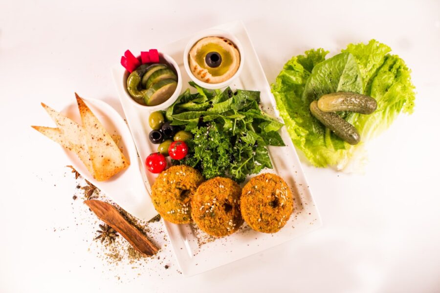 Falafel with hummus, salad, pickles, and bread