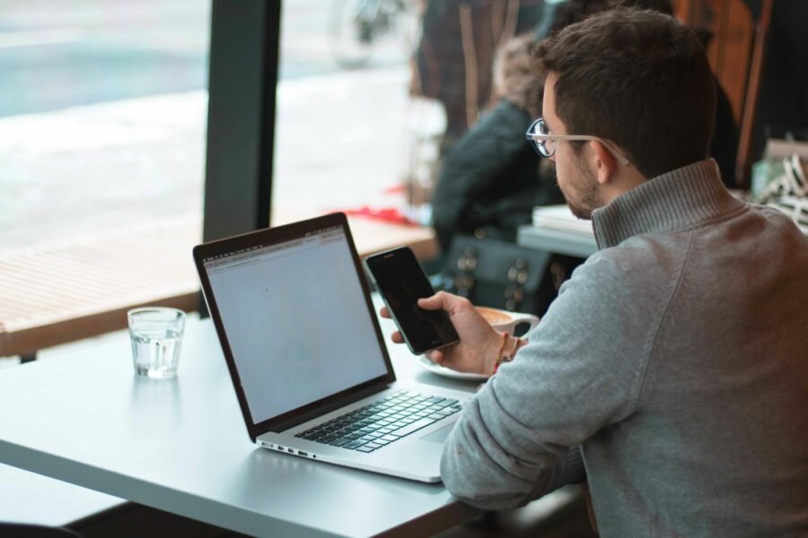 Laptop smartphone coffee table subscription management