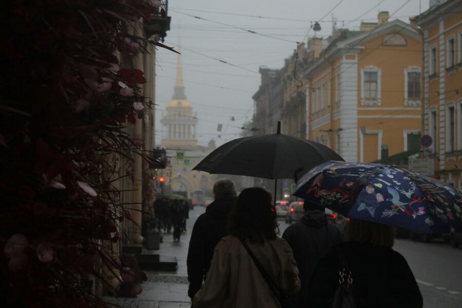 Quiet european street autumn umbrellas