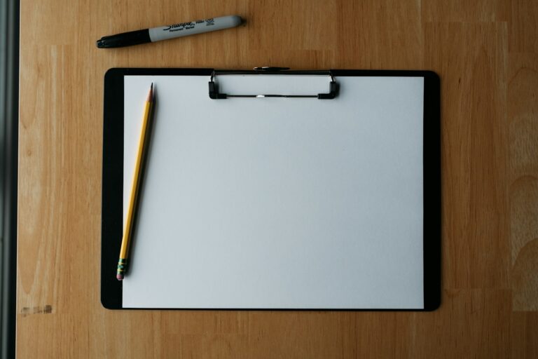Handwritten potluck sign sheet clipboard