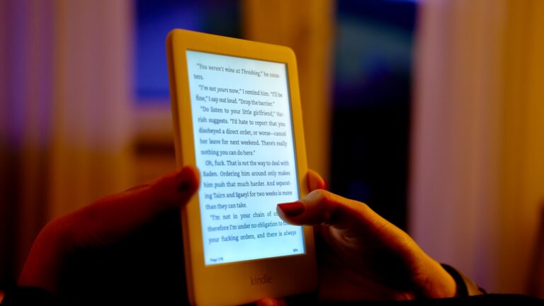 Smartphone notifications lock screen person reading book evening