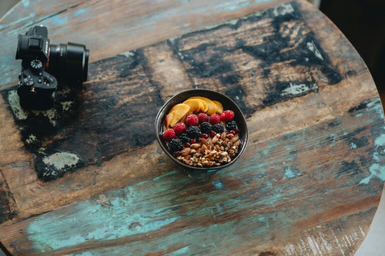 Bowl nuts berries wooden table