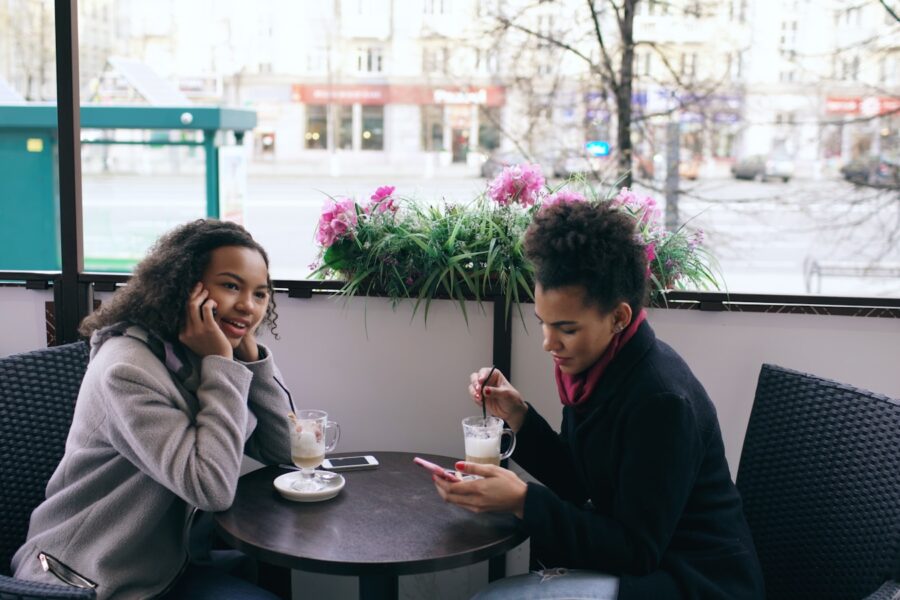 Couple sitting cafe terrace talking