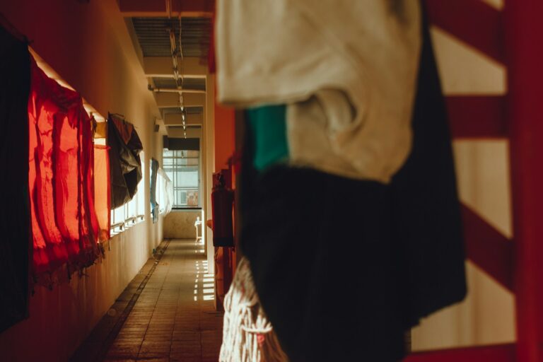 School morning routine hallway backpacks parent helping child