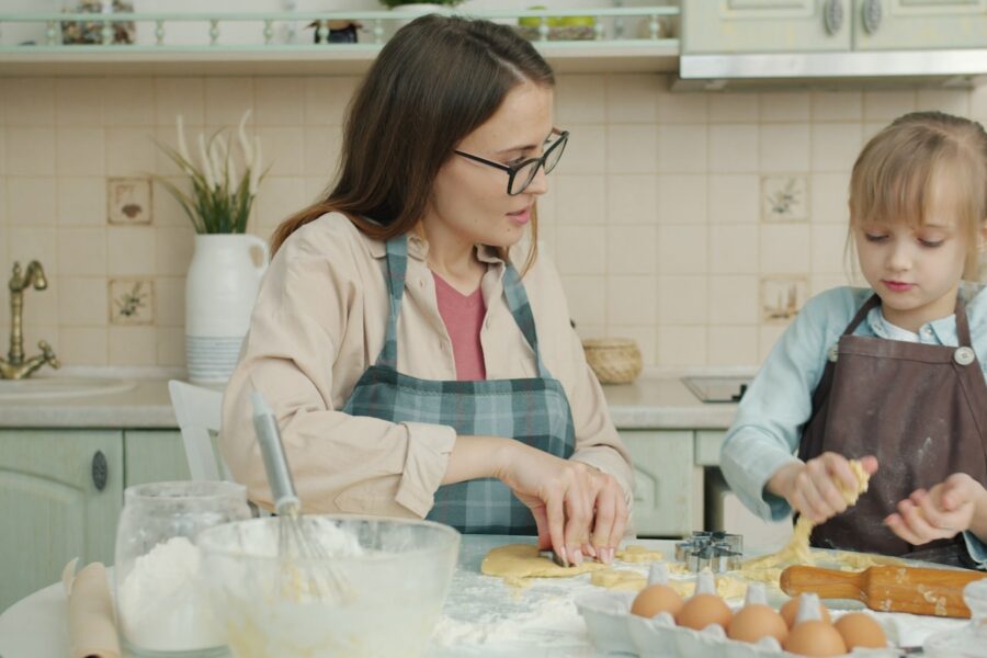 Parents children cooking kitchen counter