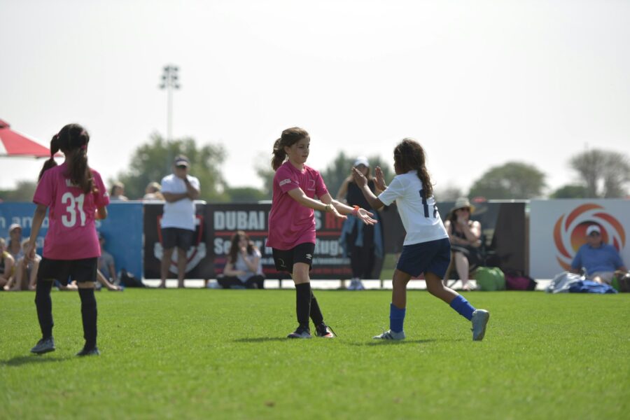 Recreational soccer players post game stretching field