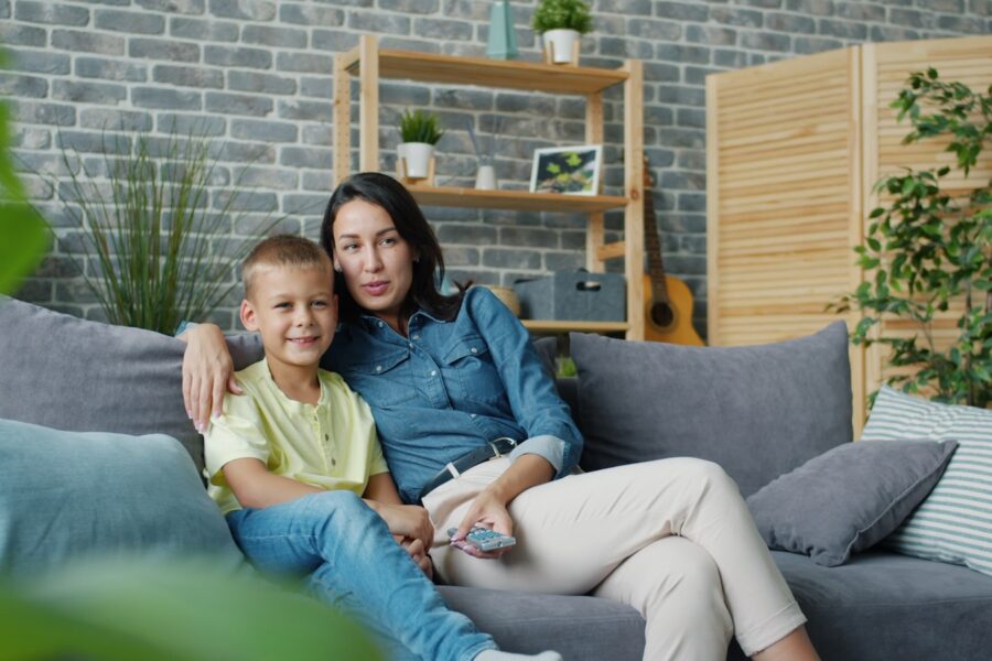 Parent child hugging living room