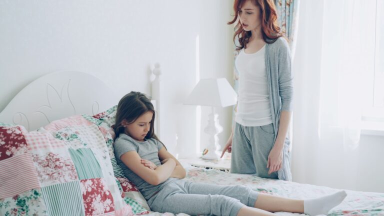 Siblings arguing bedroom
