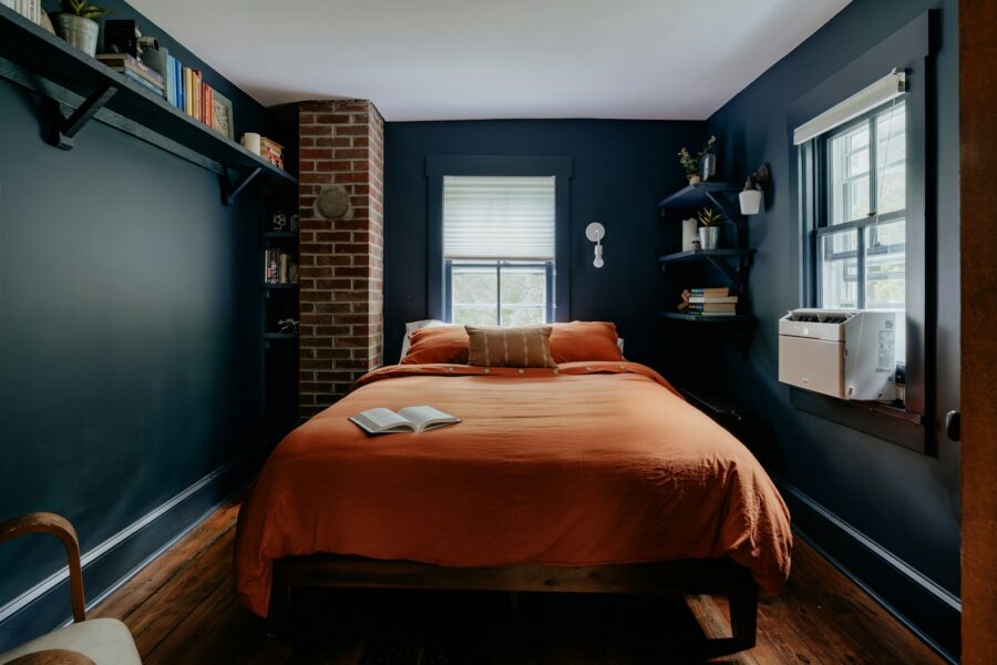 Athlete sleeping bed dark bedroom