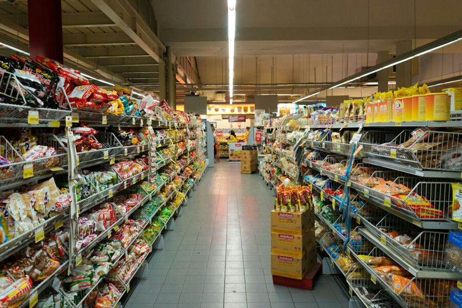 Grocery cart fresh vegetables fruit supermarket aisle