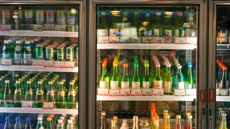 Fridge shelf organized leftovers glass containers shopping list