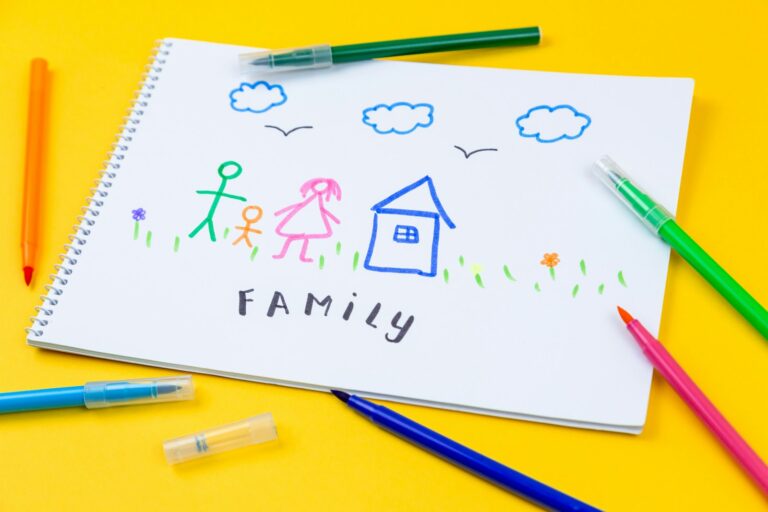 Child drawing postcard grandparent