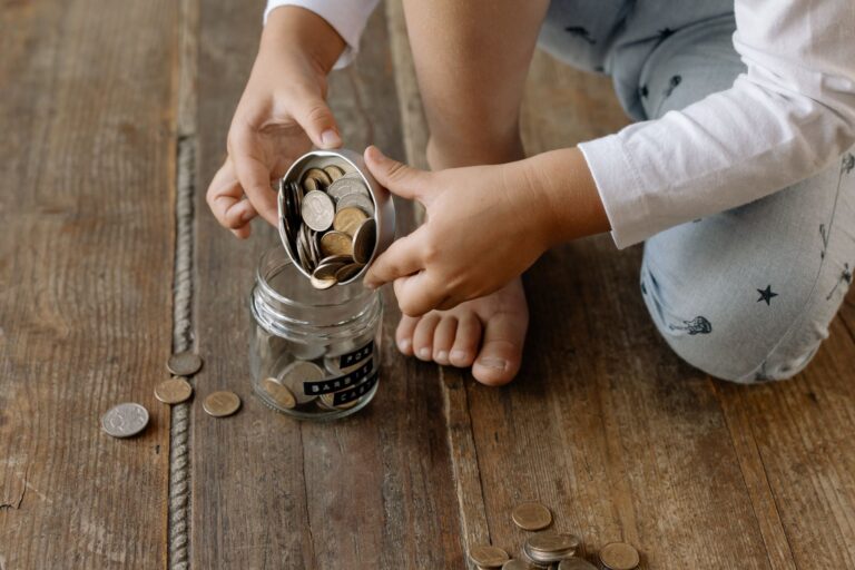 Child counting coins