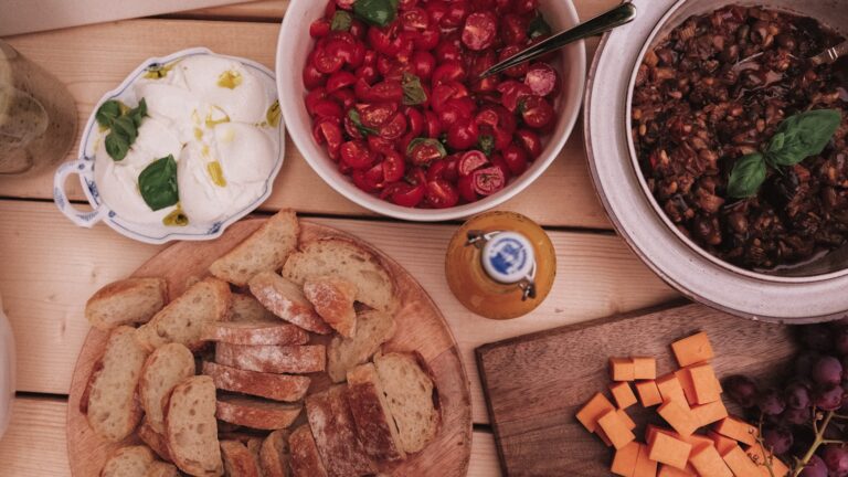 Grazing board wooden platter cheese vegetables fruit