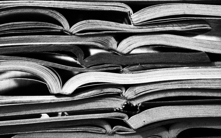 Crowded bookshelf printed