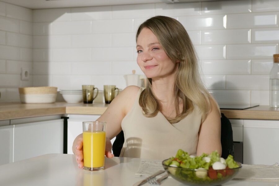 Woman eating salad
