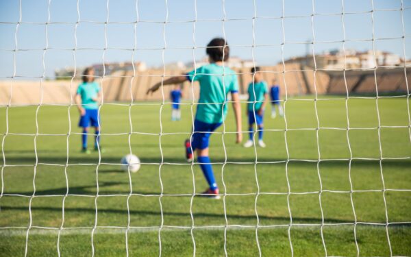 How backyard games can build real skills for young football and basketball players