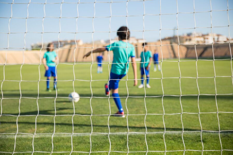 Kids playing football