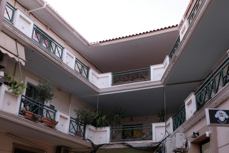 Courtyard apartment balconies small concert urban street people