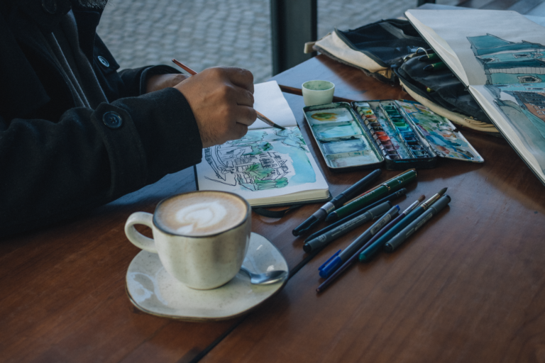 Artist sketching cafe