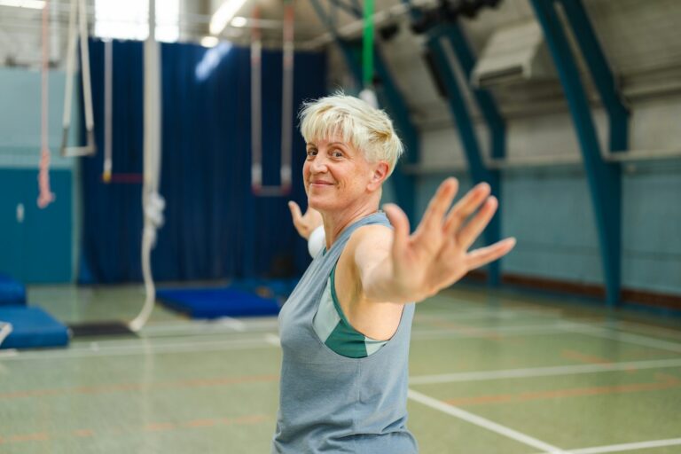 Senior woman resistance band home workout