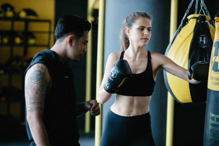 Boxing coach teaching