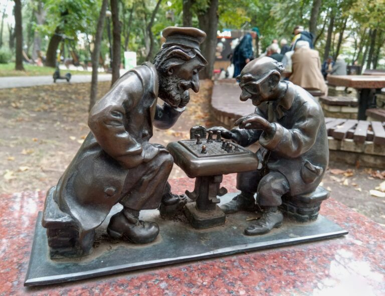 City park chess tables wooden chess pieces