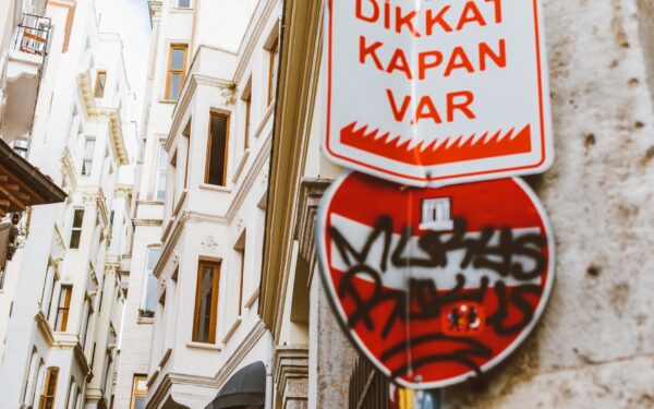 How to avoid common travel scams and stay safe in busy tourist areas