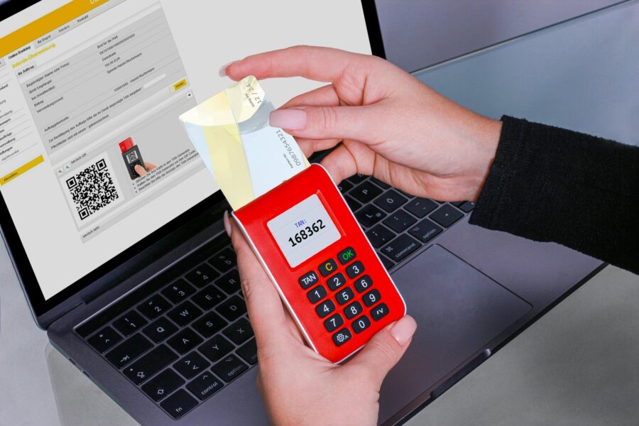 Person using laptop two factor authentication code