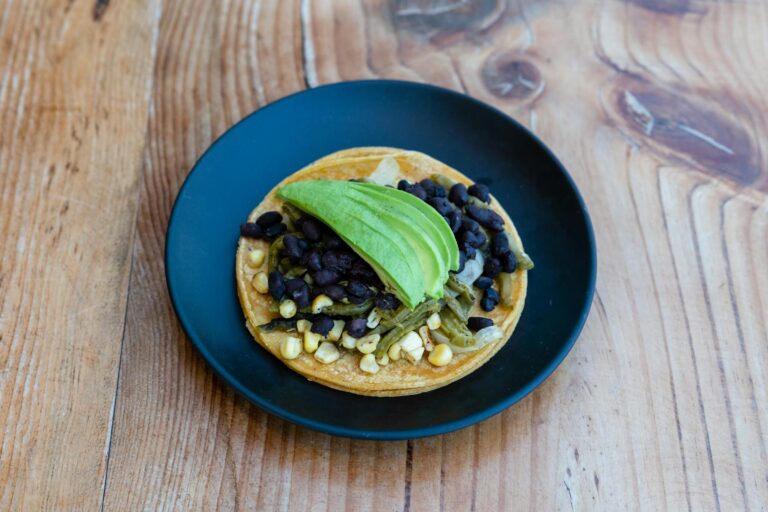Bean tostada toast herbs bean tacos wooden board