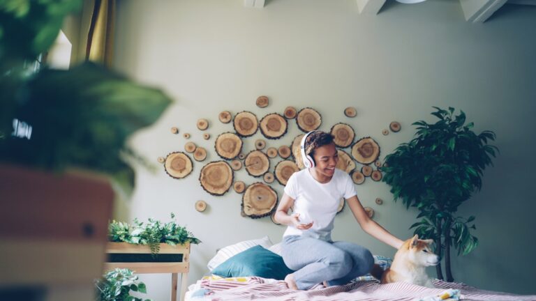 Bedroom air purifier allergy relief person checking pollen