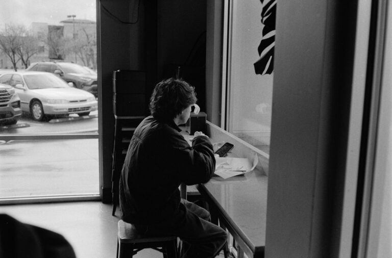Person sitting alone