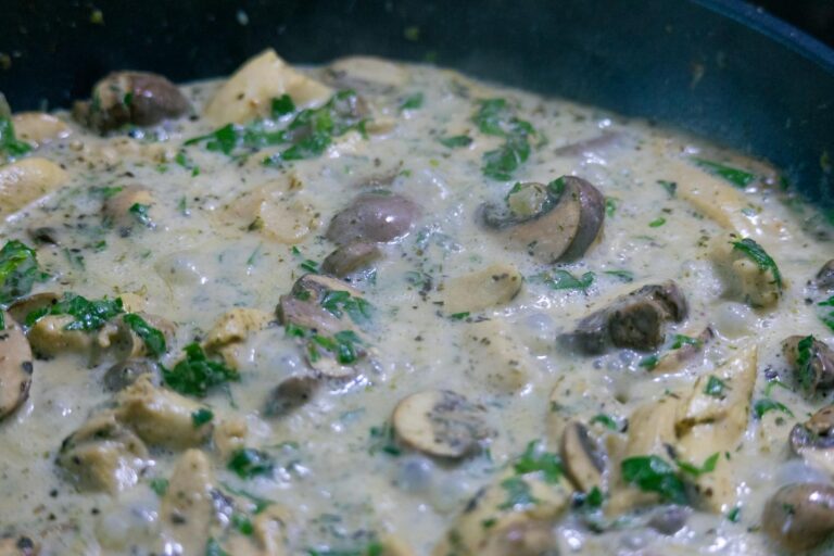 Seared chicken breast lemon herb pan sauce close