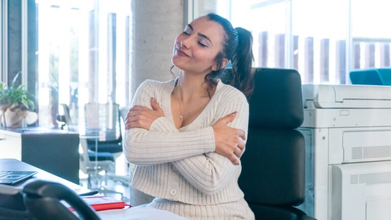 Woman sitting desk