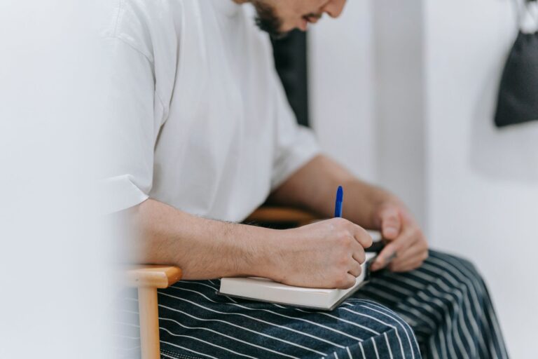 Man writing workout