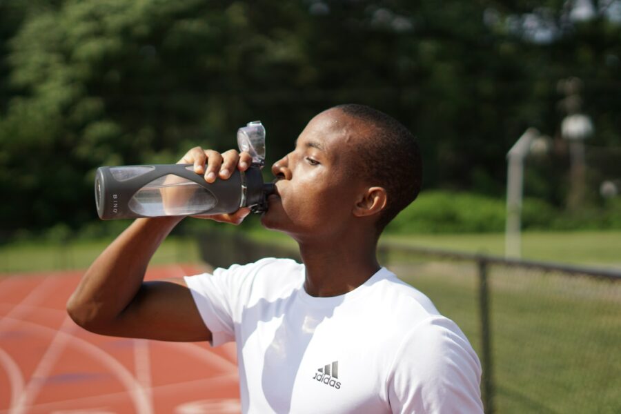 Runner water bottle hot day track