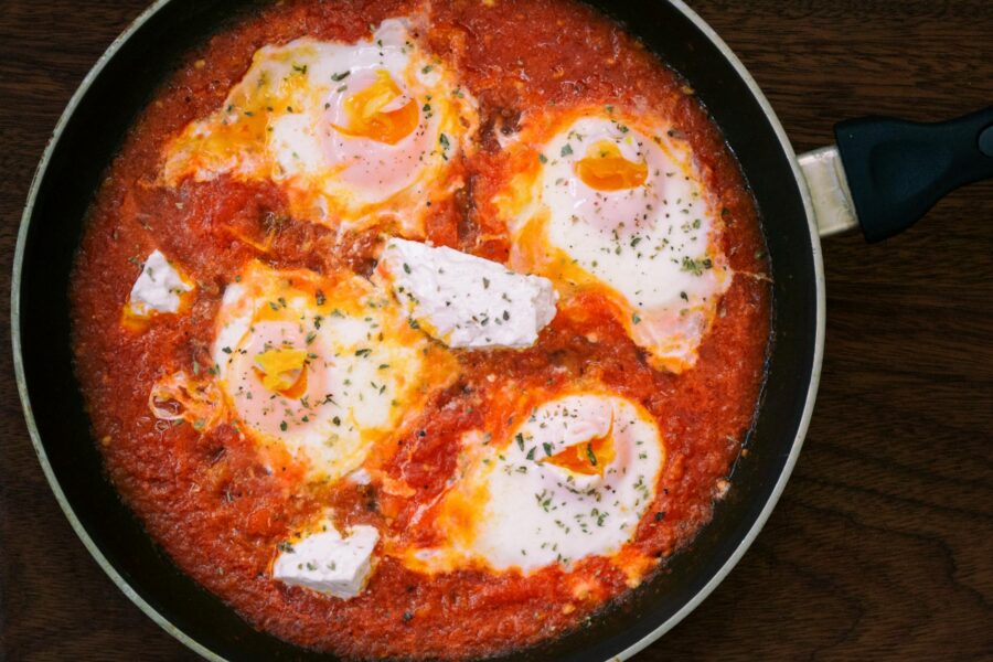 Egg skillet shakshuka tomatoes herbs