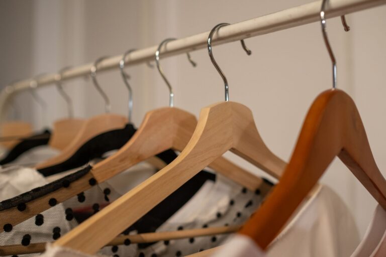 Person decluttering closet