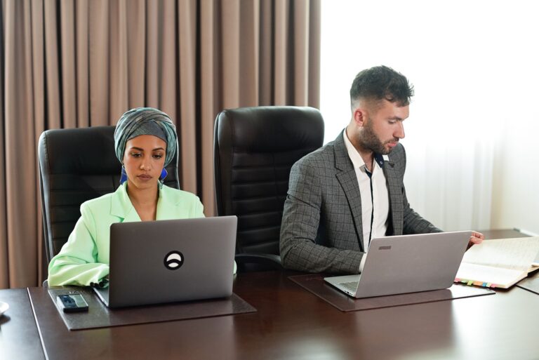 Coworkers reading email