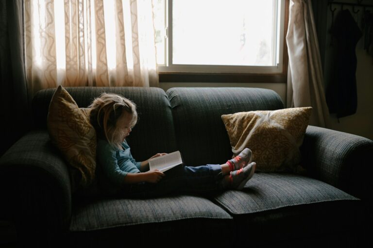 Siblings reading book