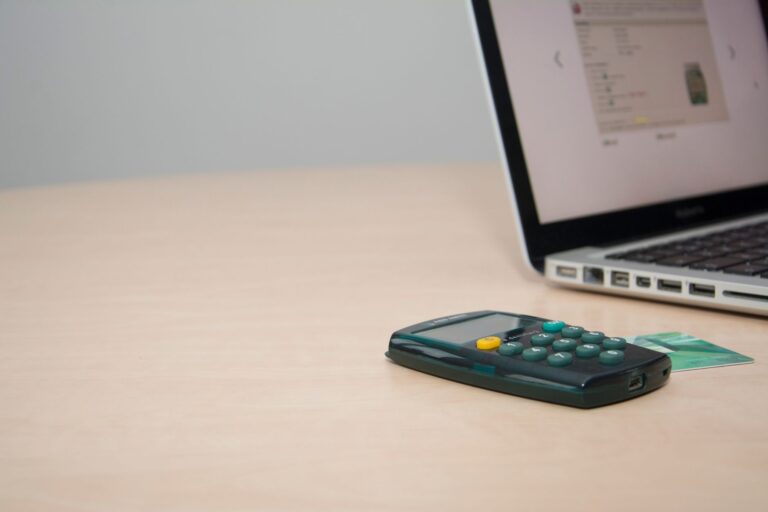 Laptop desk bank statements subscription list detail