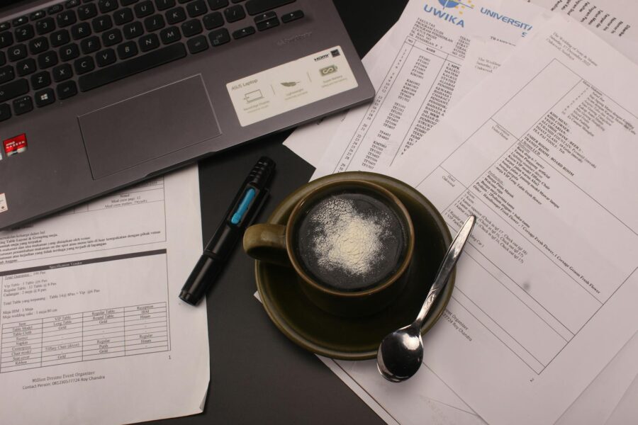 Desk paperwork laptop