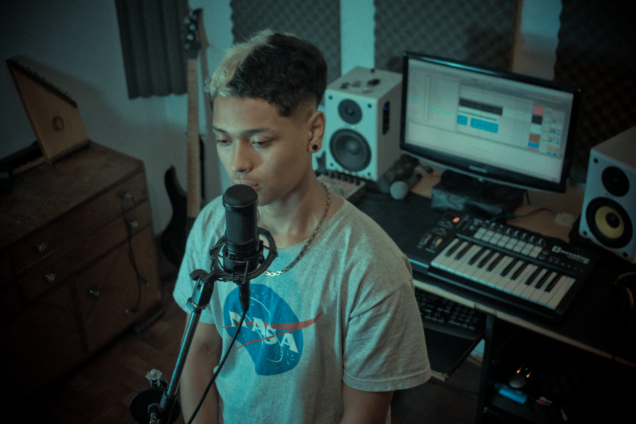 Young musician recording