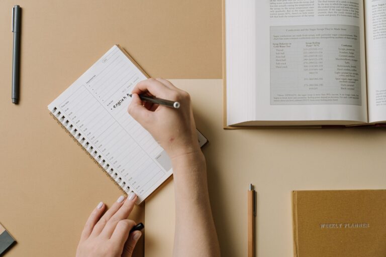 Person writing weekly