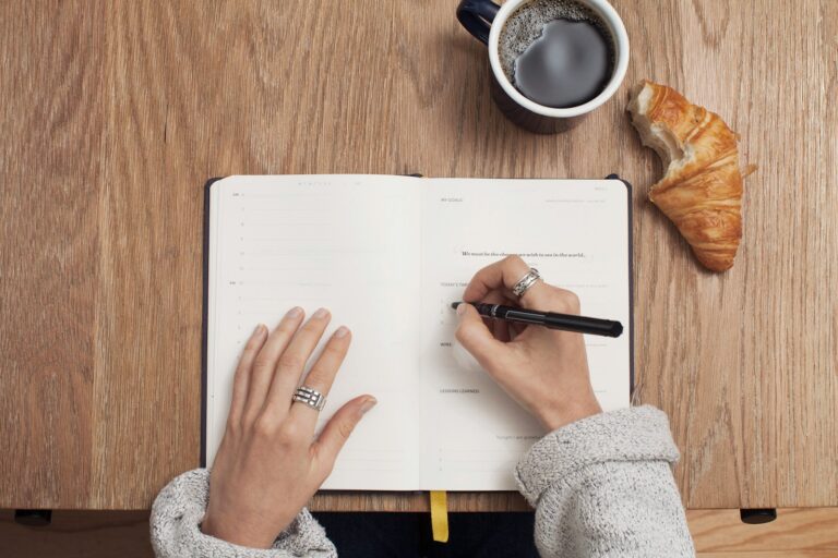 Person writing weekly